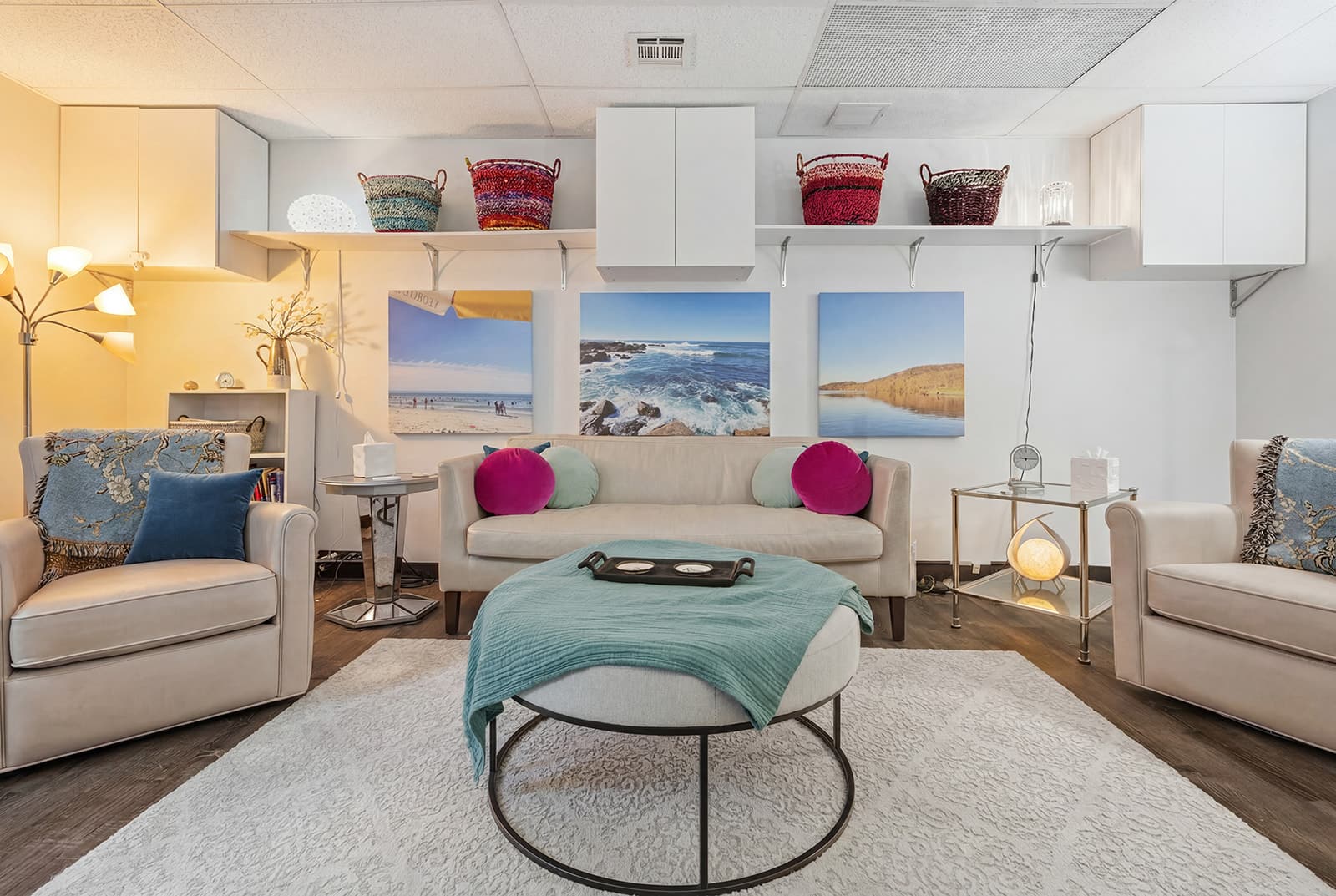 The seating in Karen Sussan's Suffern office, a sofa flanked by two armchairs around a shared ottoman